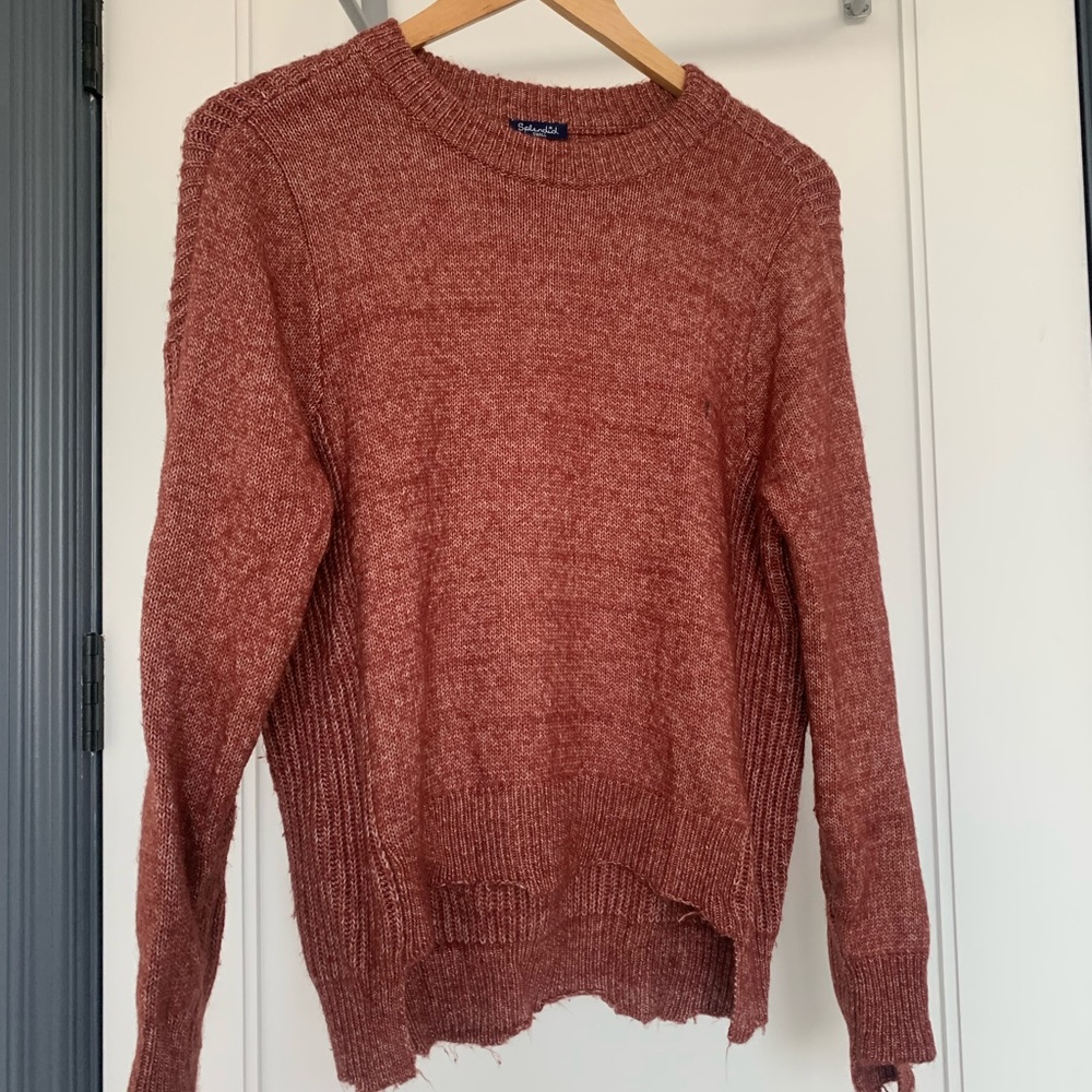 Distressed pink sweater